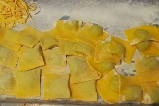 Clase de cocina italiana con comida